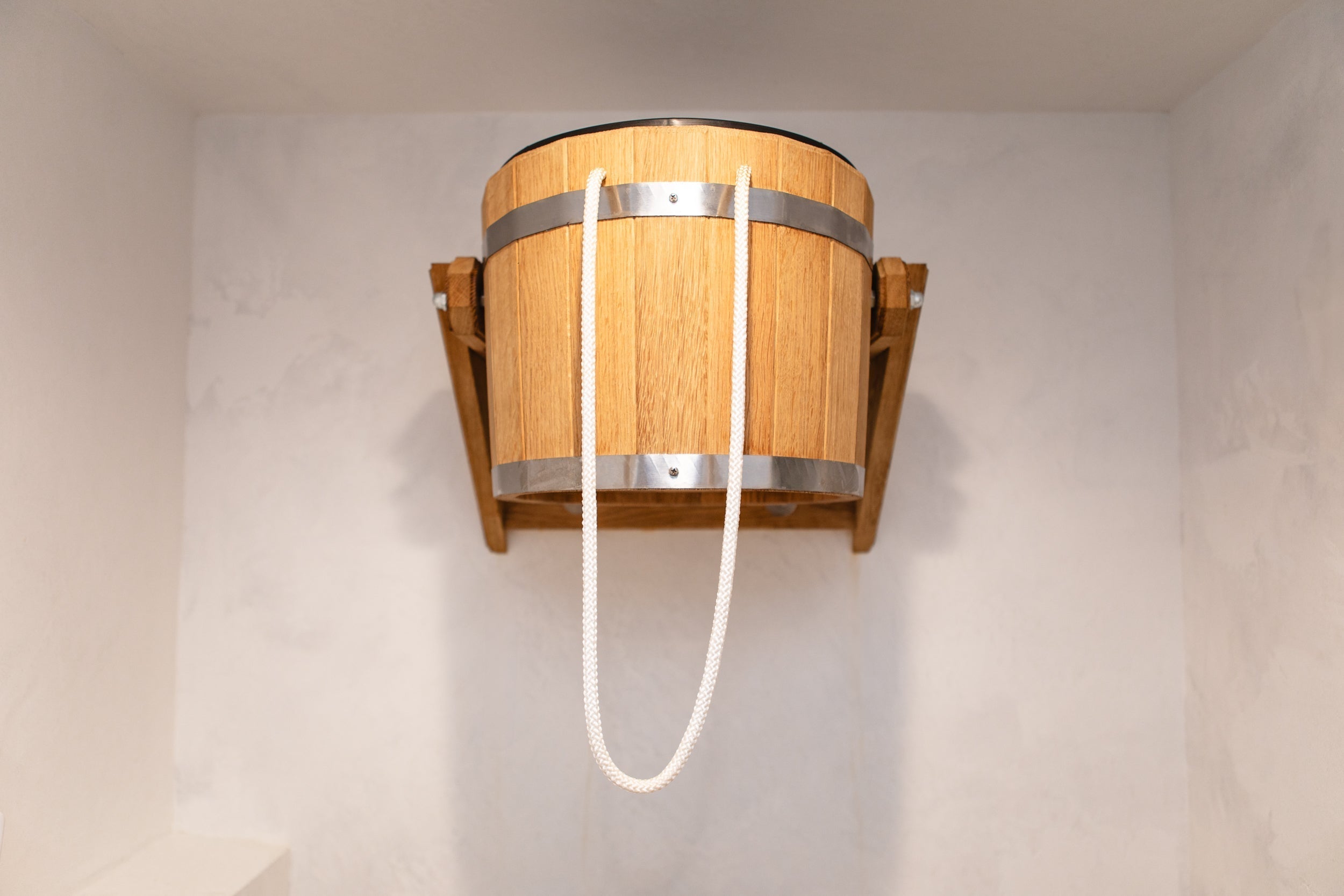 A polar waterfall plunge is a luxurious spa experience providing cold immersion therapy.