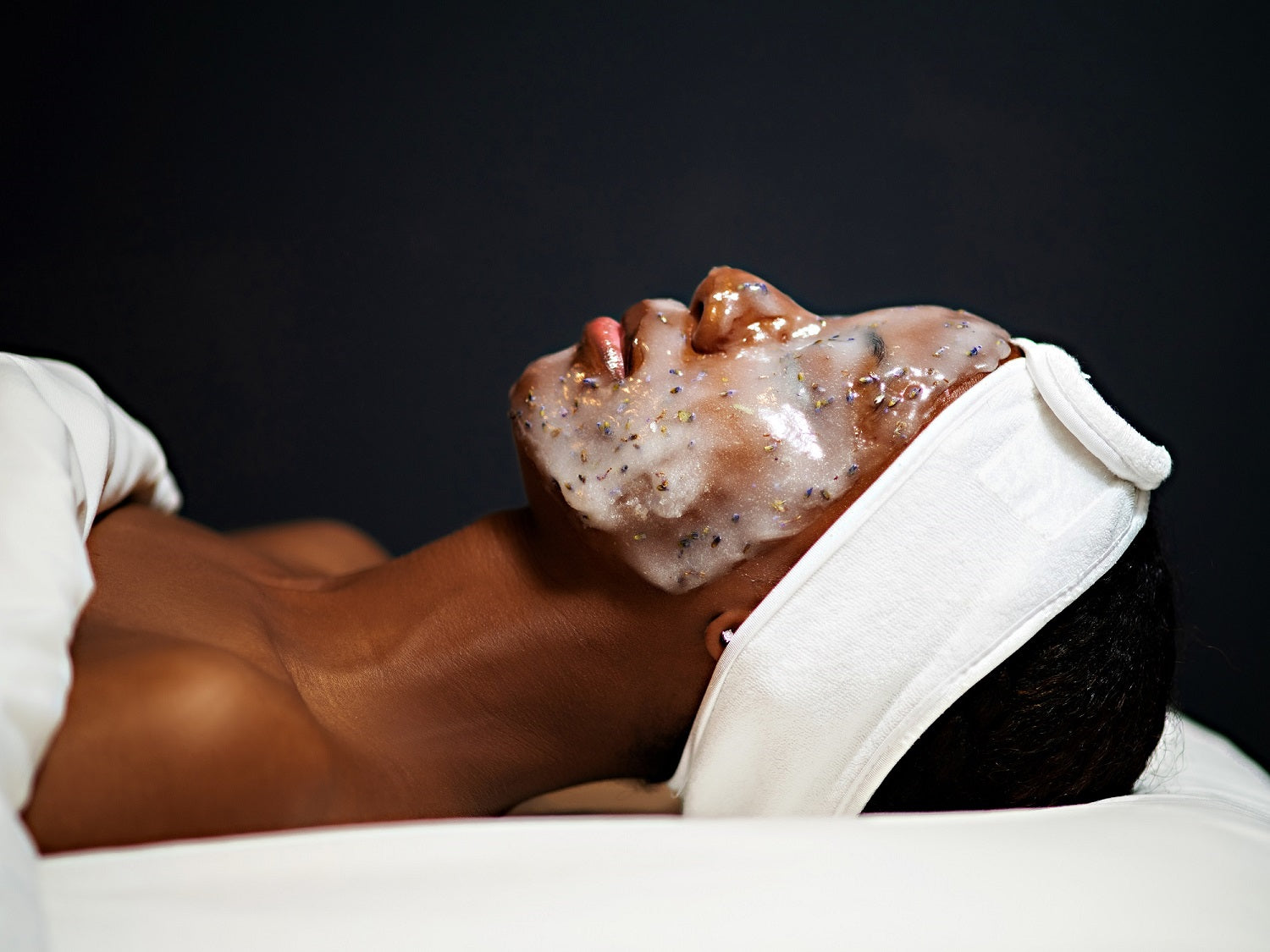 Guest enjoys botanical jelly mask facial at Pure Skin Wellness Spa designed to hydrate and calm the skin naturally