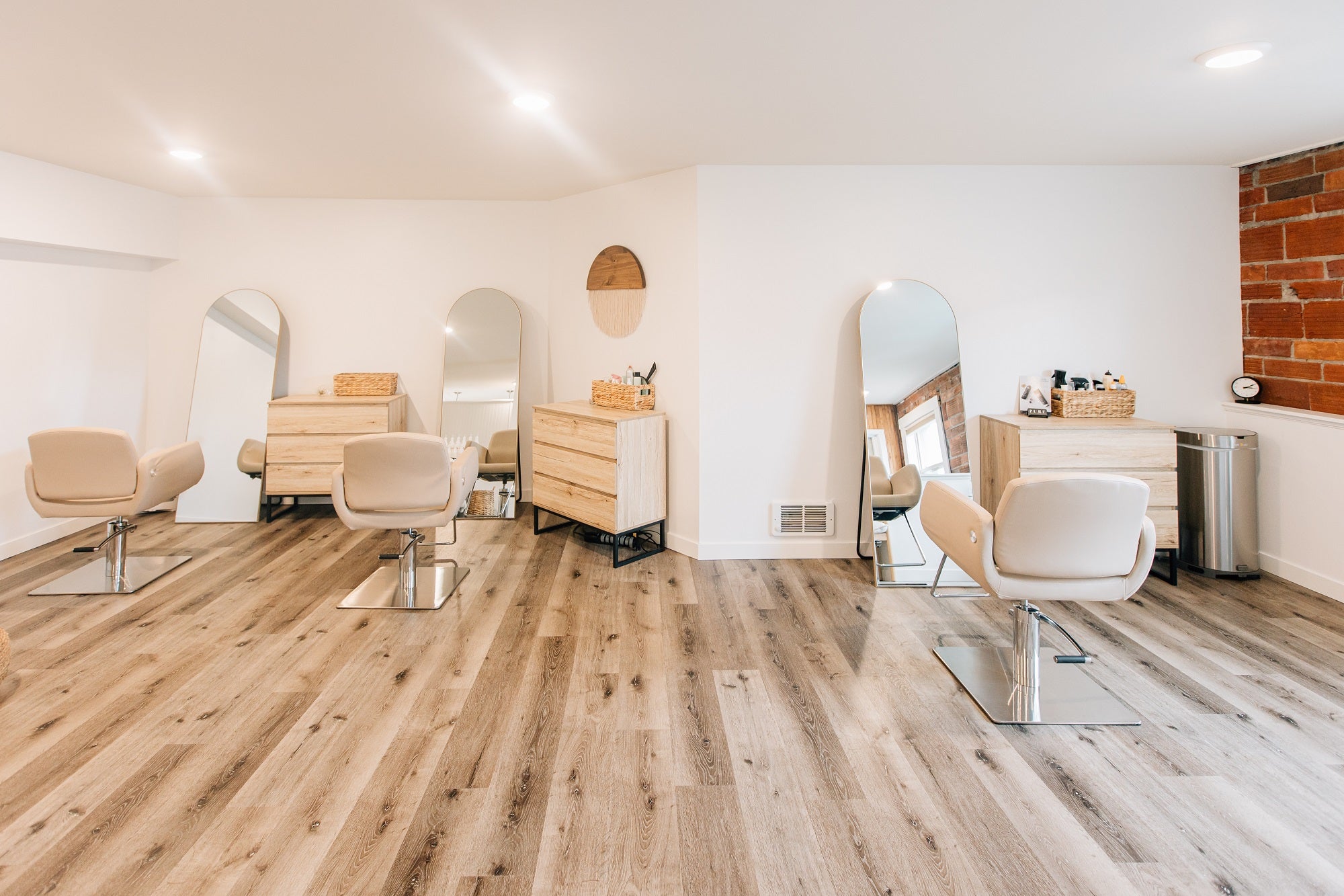 spacious hair salon with three booth chairs