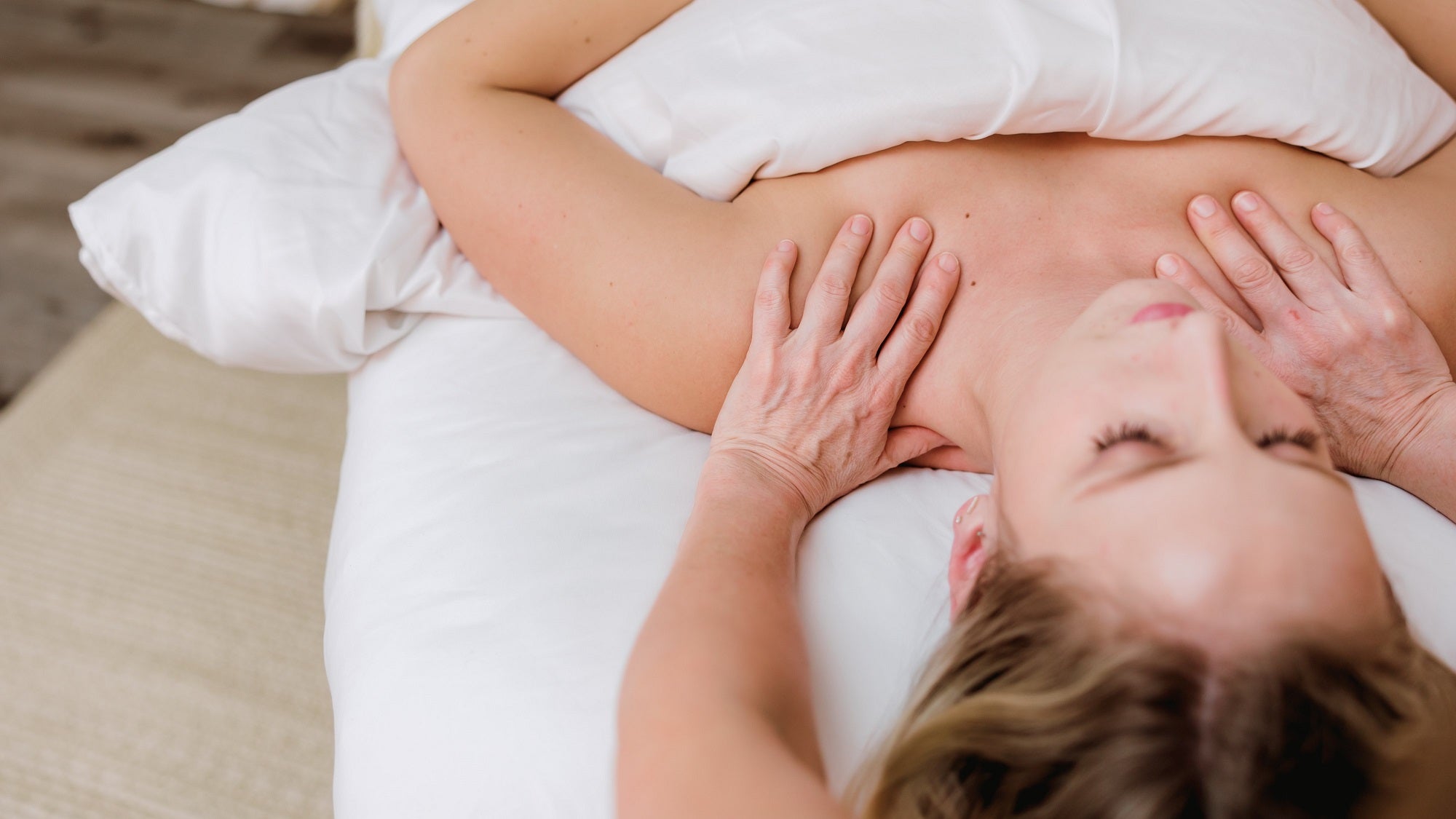 woman receiving shoulder massage