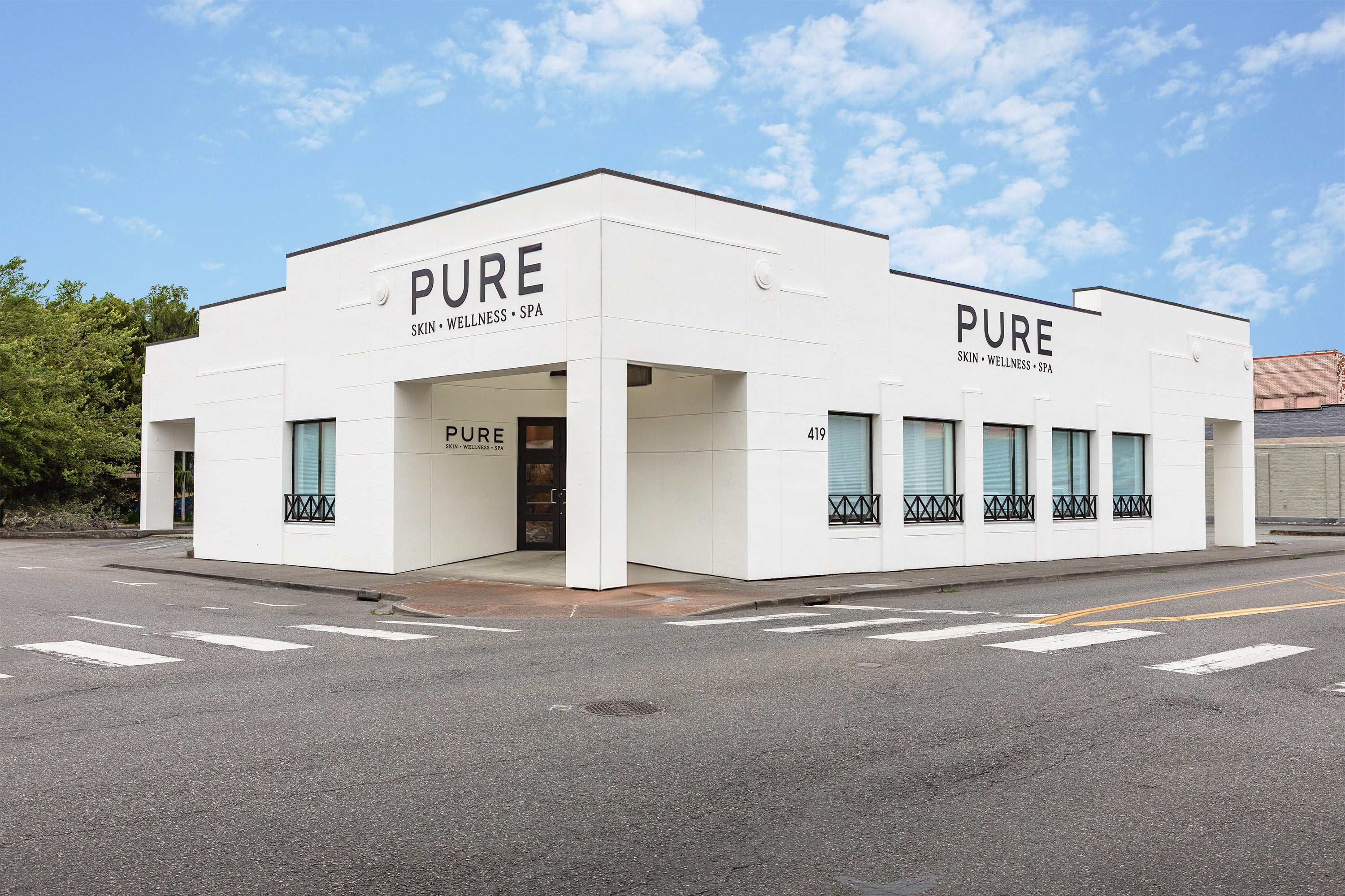 Exterior of Pure Skin Wellness Spa, a luxury medspa offering advanced skincare and holistic wellness services in a serene setting